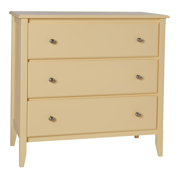 Maine Woodworks 3-drawer dresser in crescent yellow with sleek metal knobs